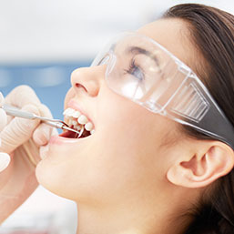 A lady getting her dental check