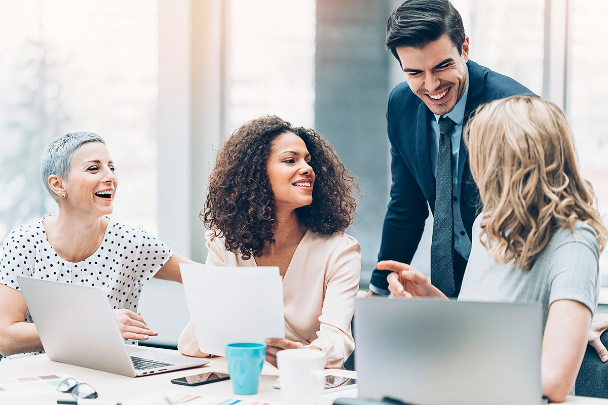 Colleagues discussing in office